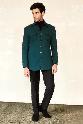 Deep Green Shacket with Black polo neck and brown pleated trousers